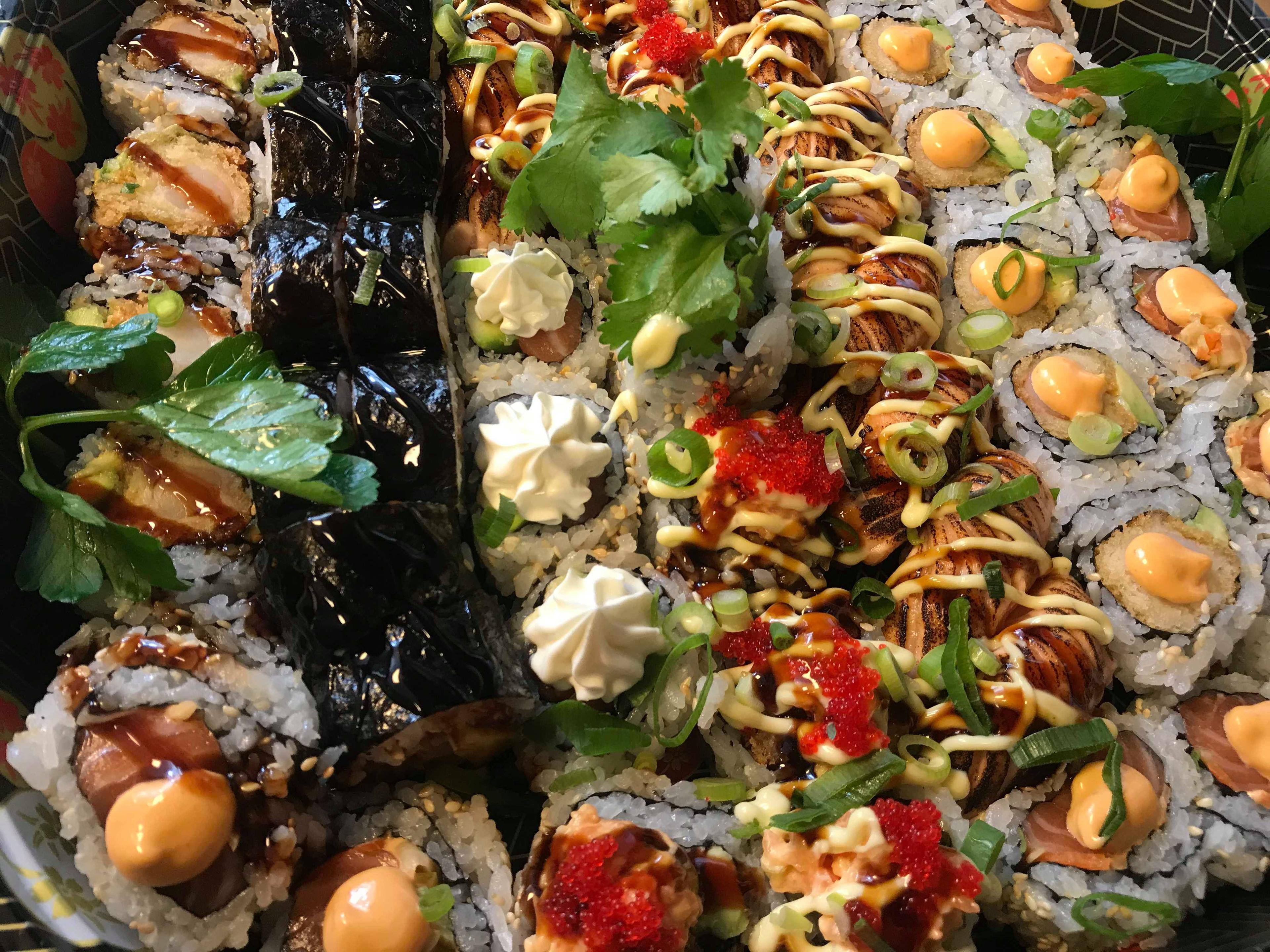 Cover image of this place Sushi City Wok